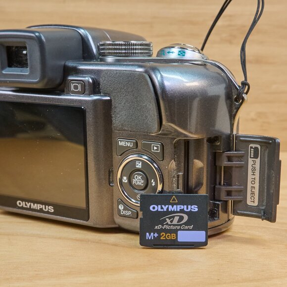 OLYMPUS SP-550UZ 7.1MP Digital Camera, 18x Optical Zoom, Image Stabilization - Picture 9 of 9